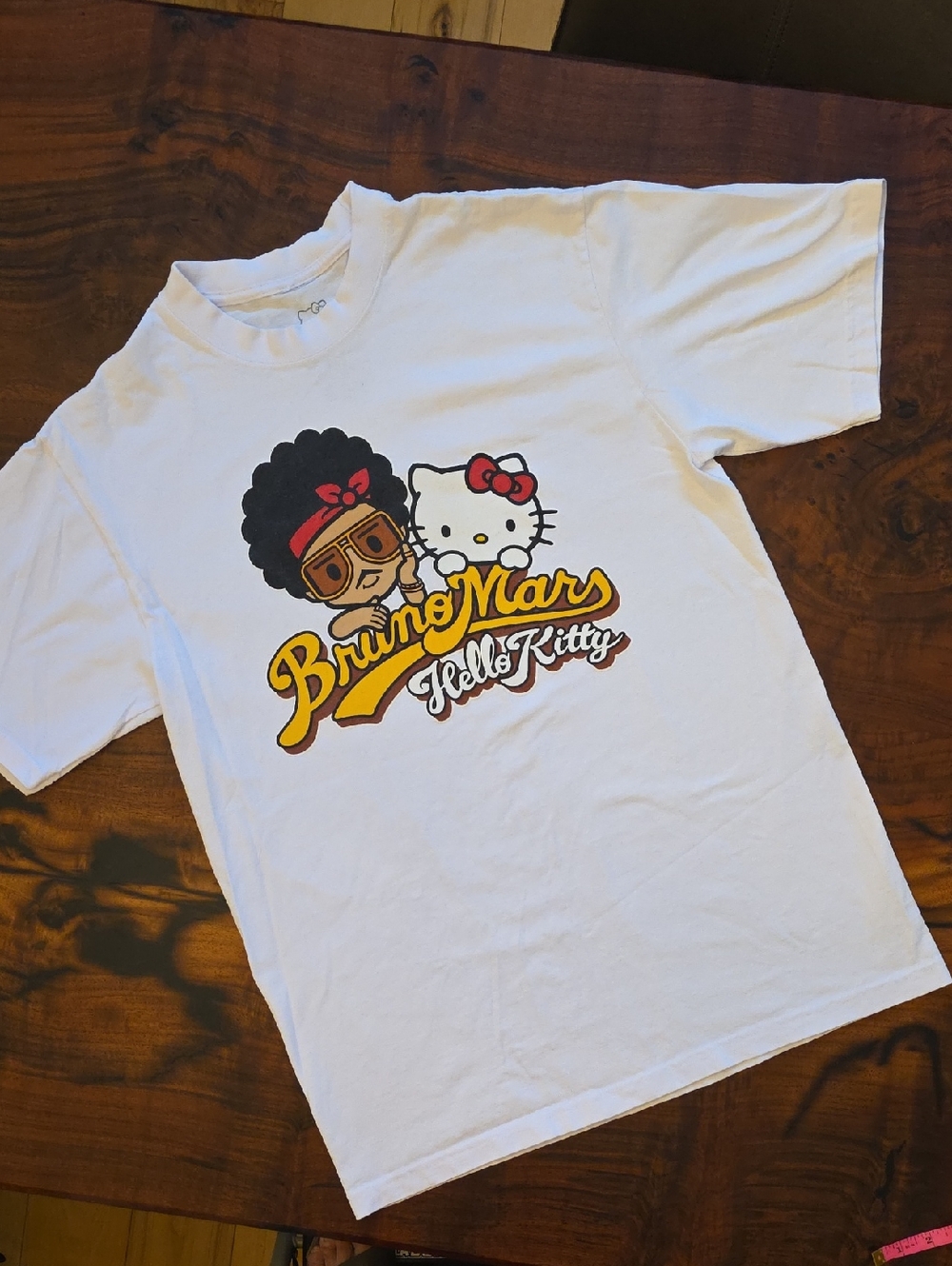 Hello Kitty Sanrio Bruno Mars White Graphic Tee with Yellow & Red Print